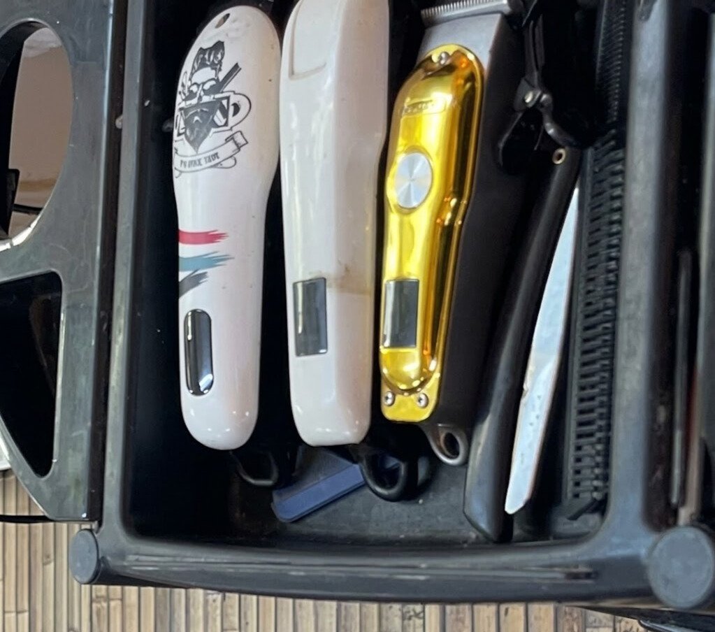 Professional barber cutting hair
